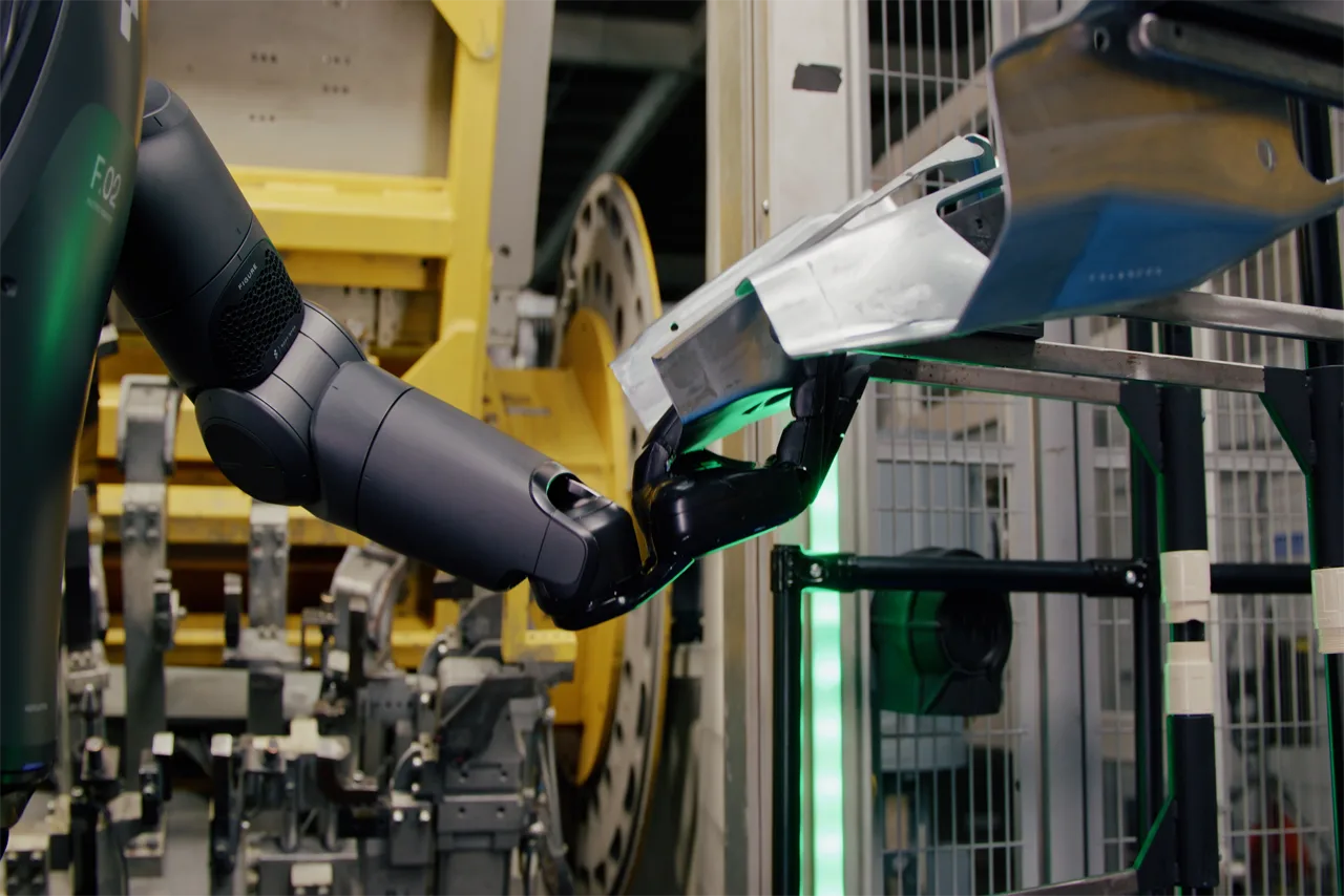Figure 02 humanoid robot working alongside human operators at BMW Group Plant Spartanburg, South Carolina