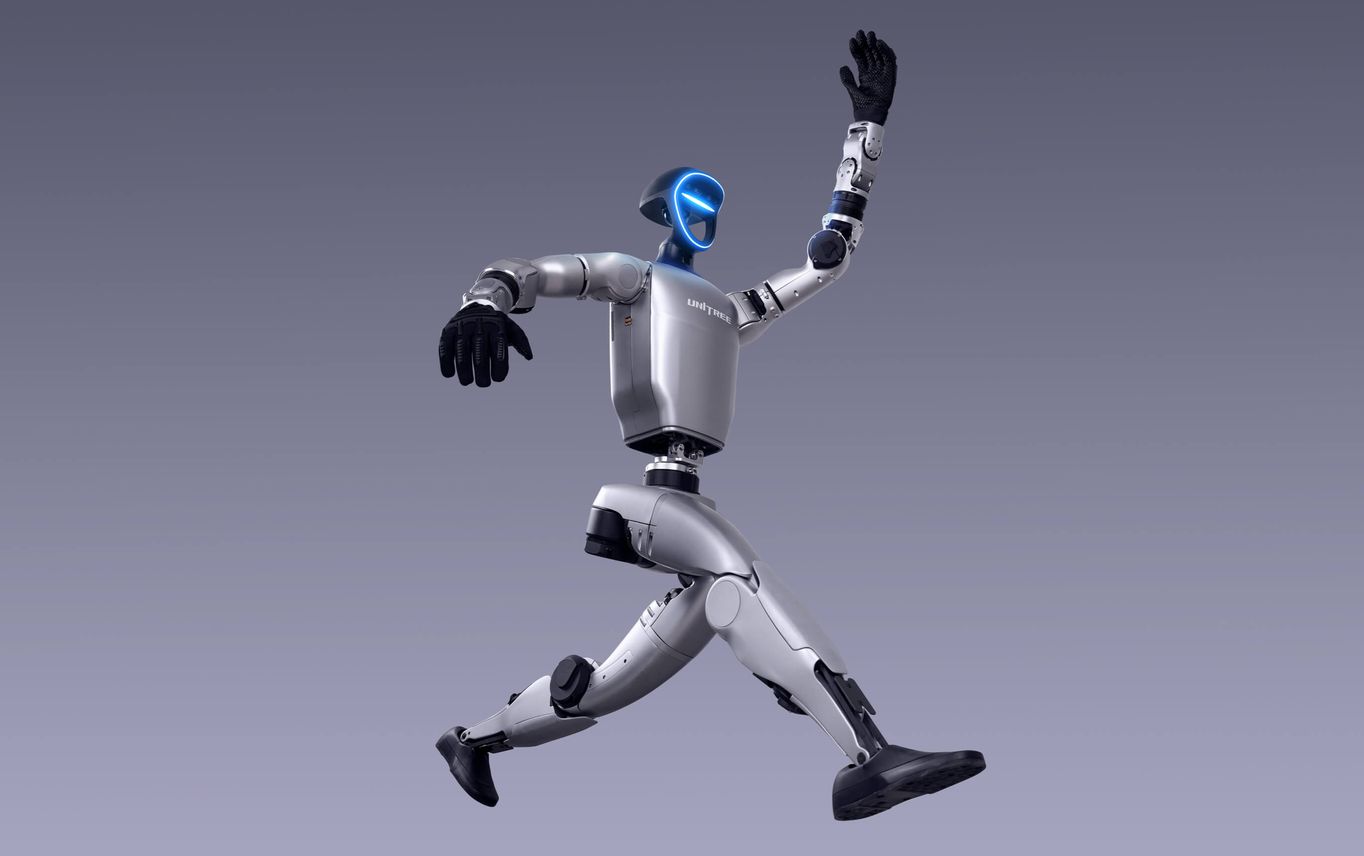 Unitree G1 in dynamic running pose, demonstrating bipedal locomotion capability. Image: Unitree Robotics