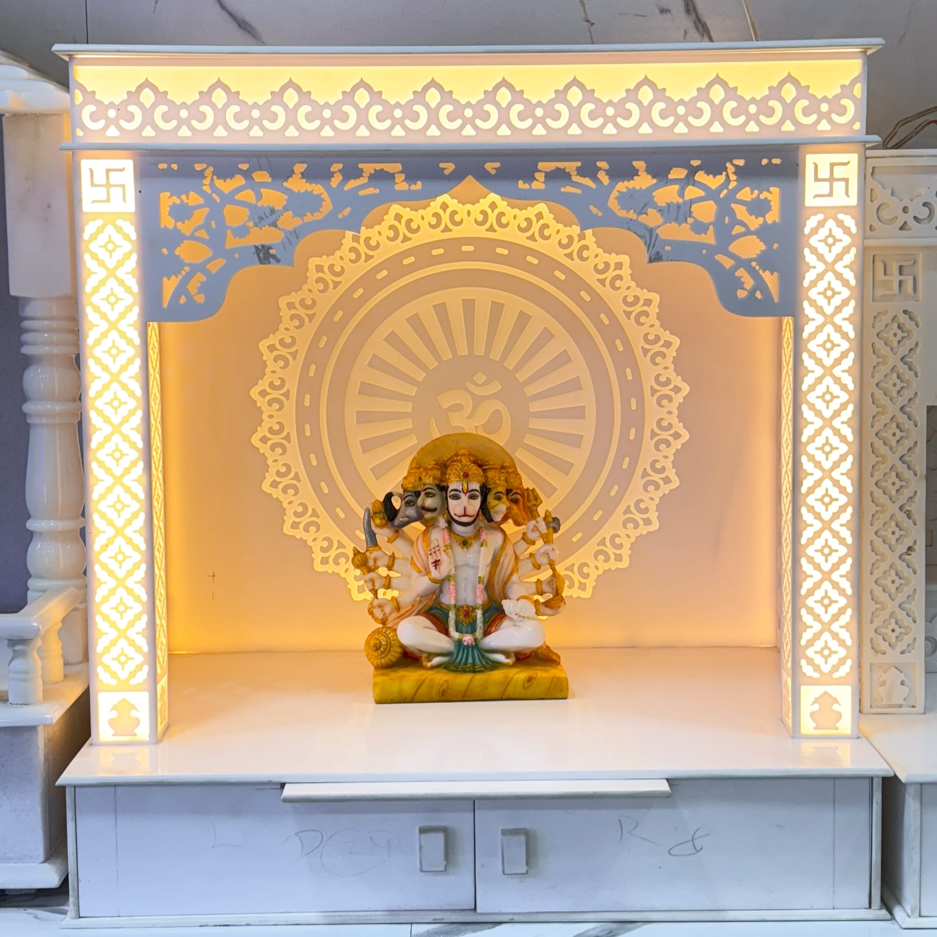 Plain modern Corian mandir in white, straight edges and no carving