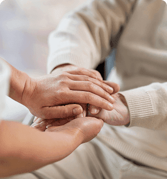 doctor_holding_hands_with_senior_patient_1_2_9b13e48c5c