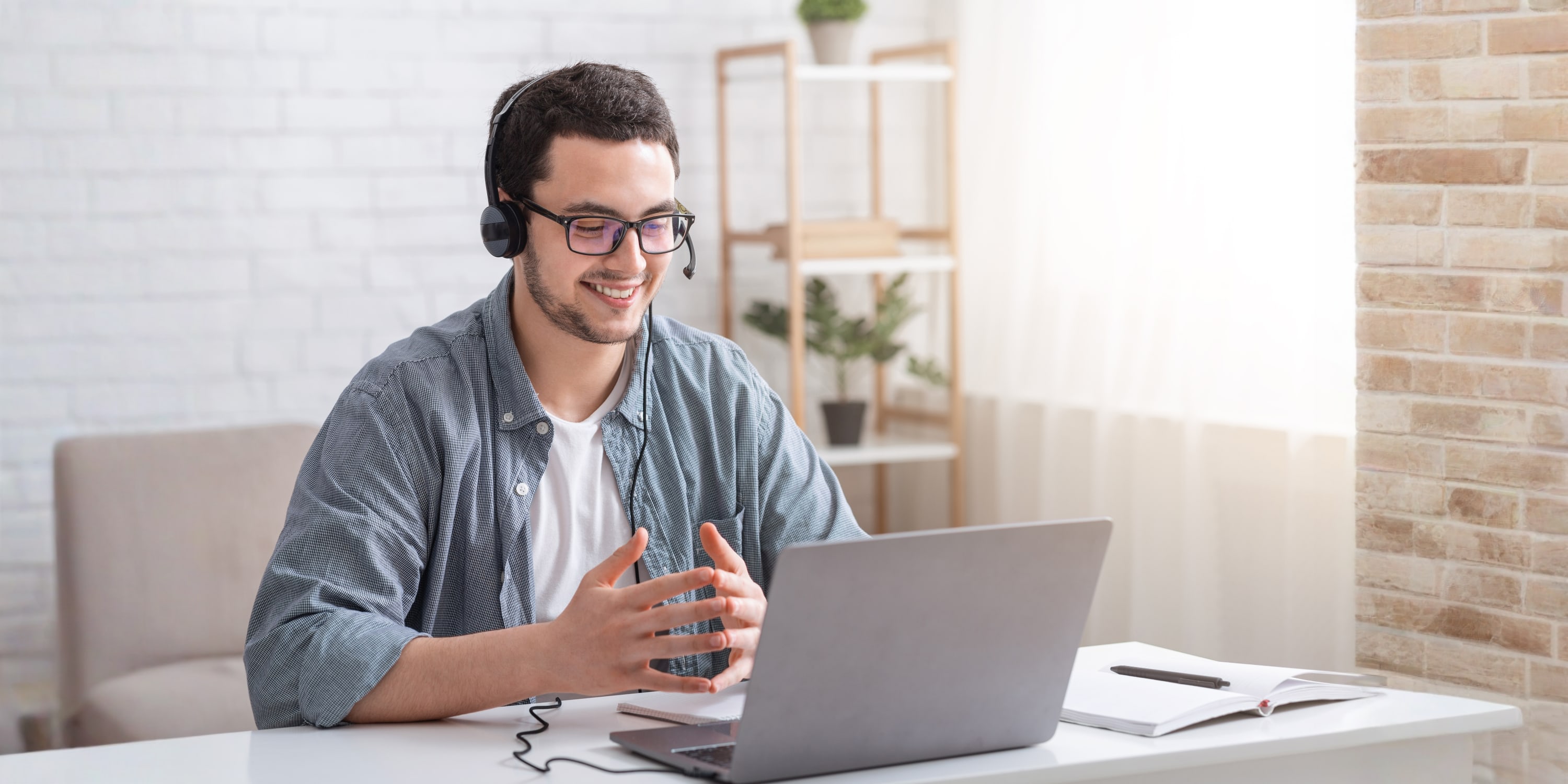 AI mock interview practice session on laptop with headset