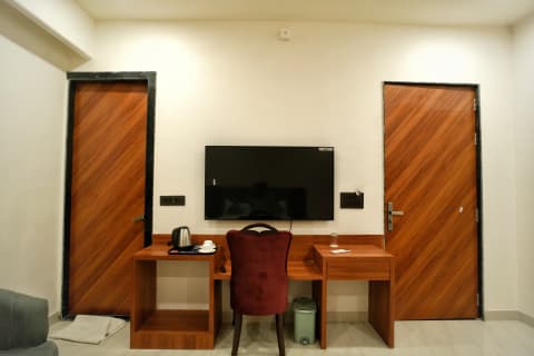 सुपर डीलक्स रूम की फ़ोटो 5