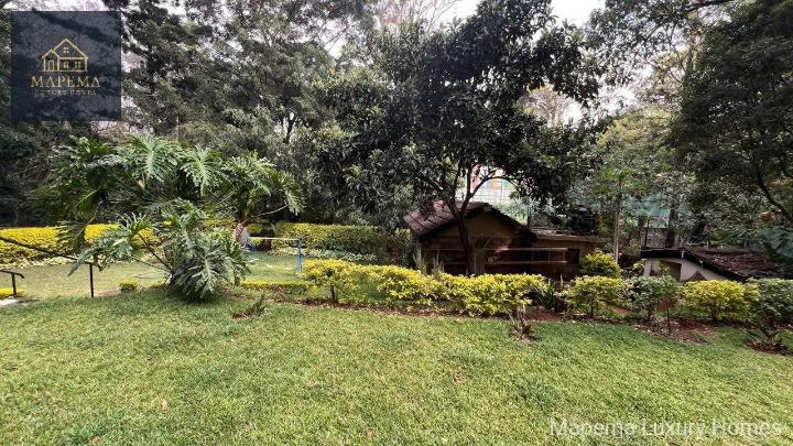 WHERE SPACE, PRESTIGE & SERENITY MEET — EXECUTIVE 5 BEDROOM TOWNHOME ON HALF ACRE