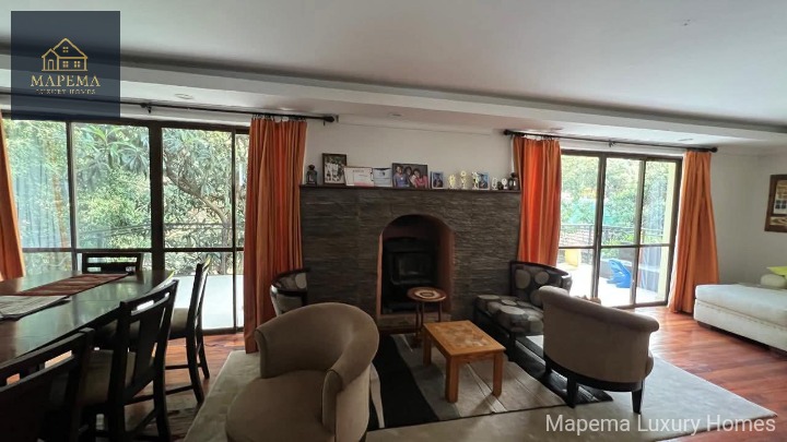 WHERE SPACE, PRESTIGE & SERENITY MEET — EXECUTIVE 5 BEDROOM TOWNHOME ON HALF ACRE