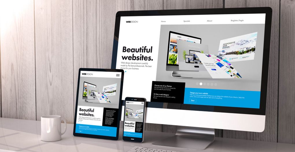A desktop computer, a tablet, and a smartphone with the sentence "Beautiful Websites" on their screens.