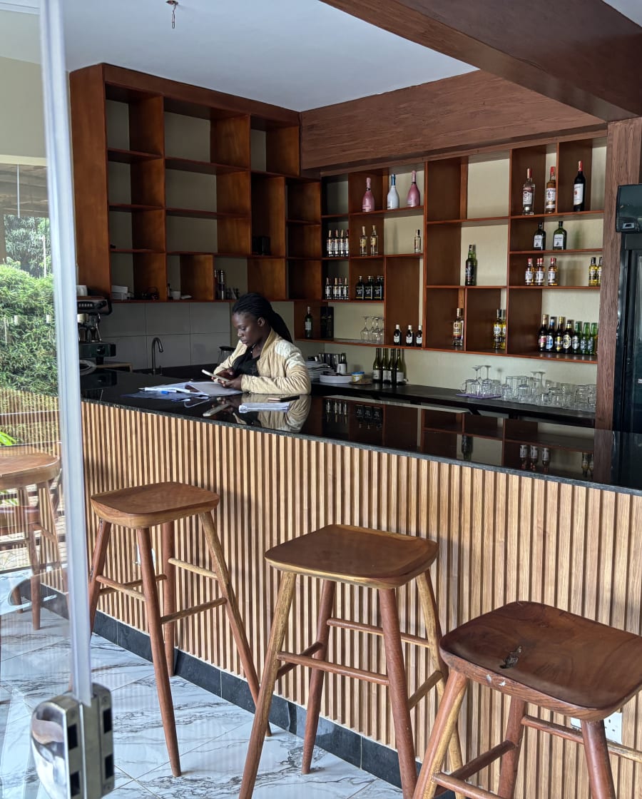 Signature cocktail preparation at Enclave bar