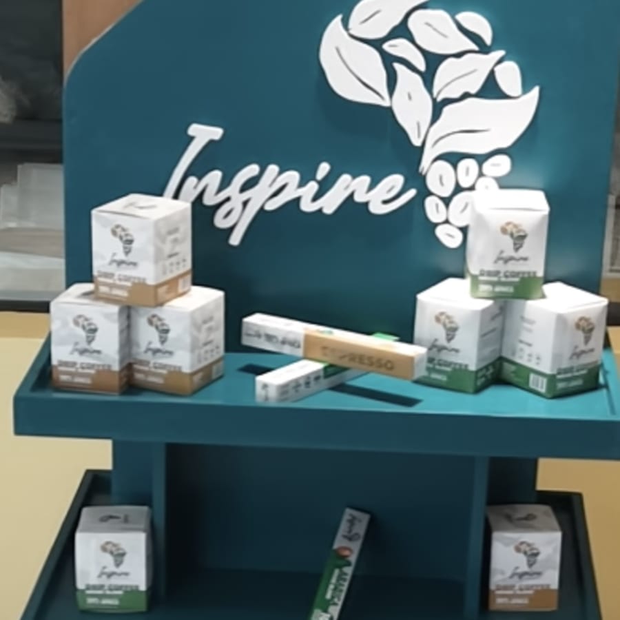 Inspire Africa coffee drip packs on a retail shelf