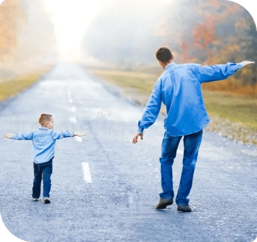 Happy parent and child walking together in nature
