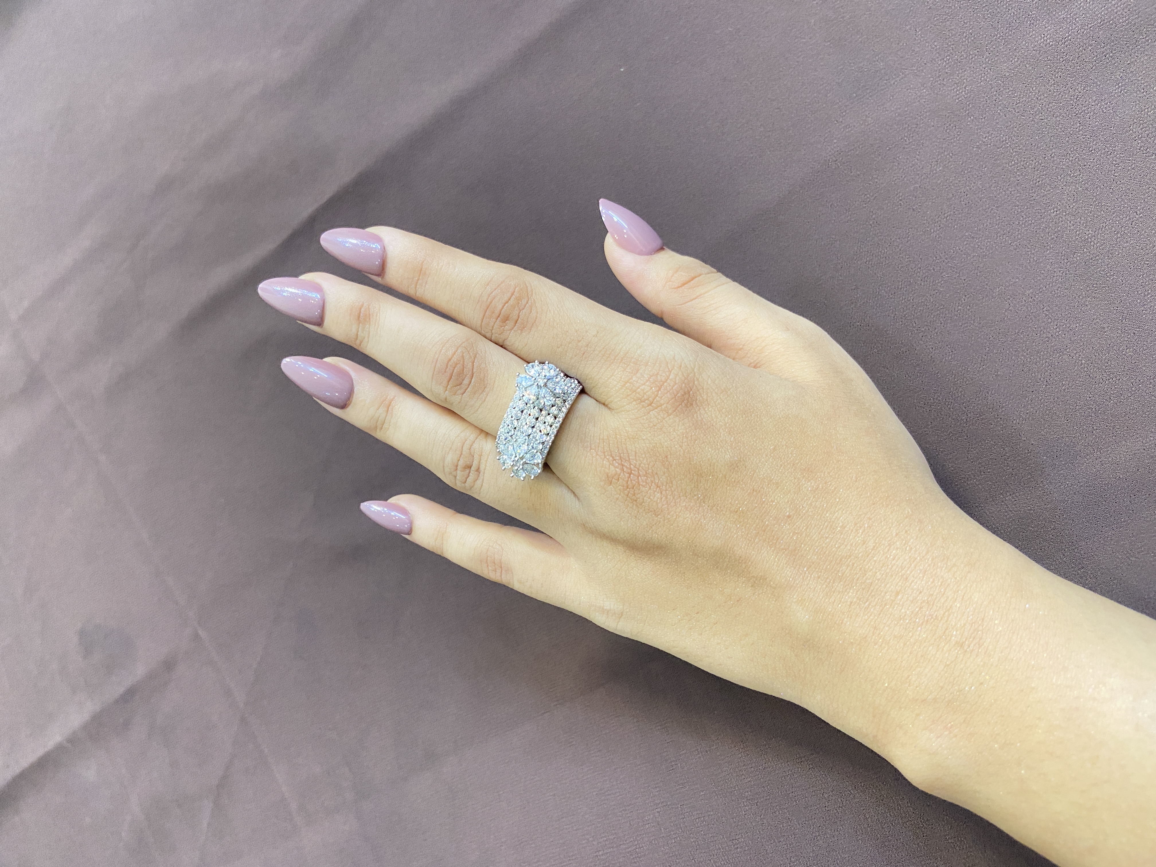 TWO FLOWER DESIGNS WITH FULL DIAMONDS BAND RING