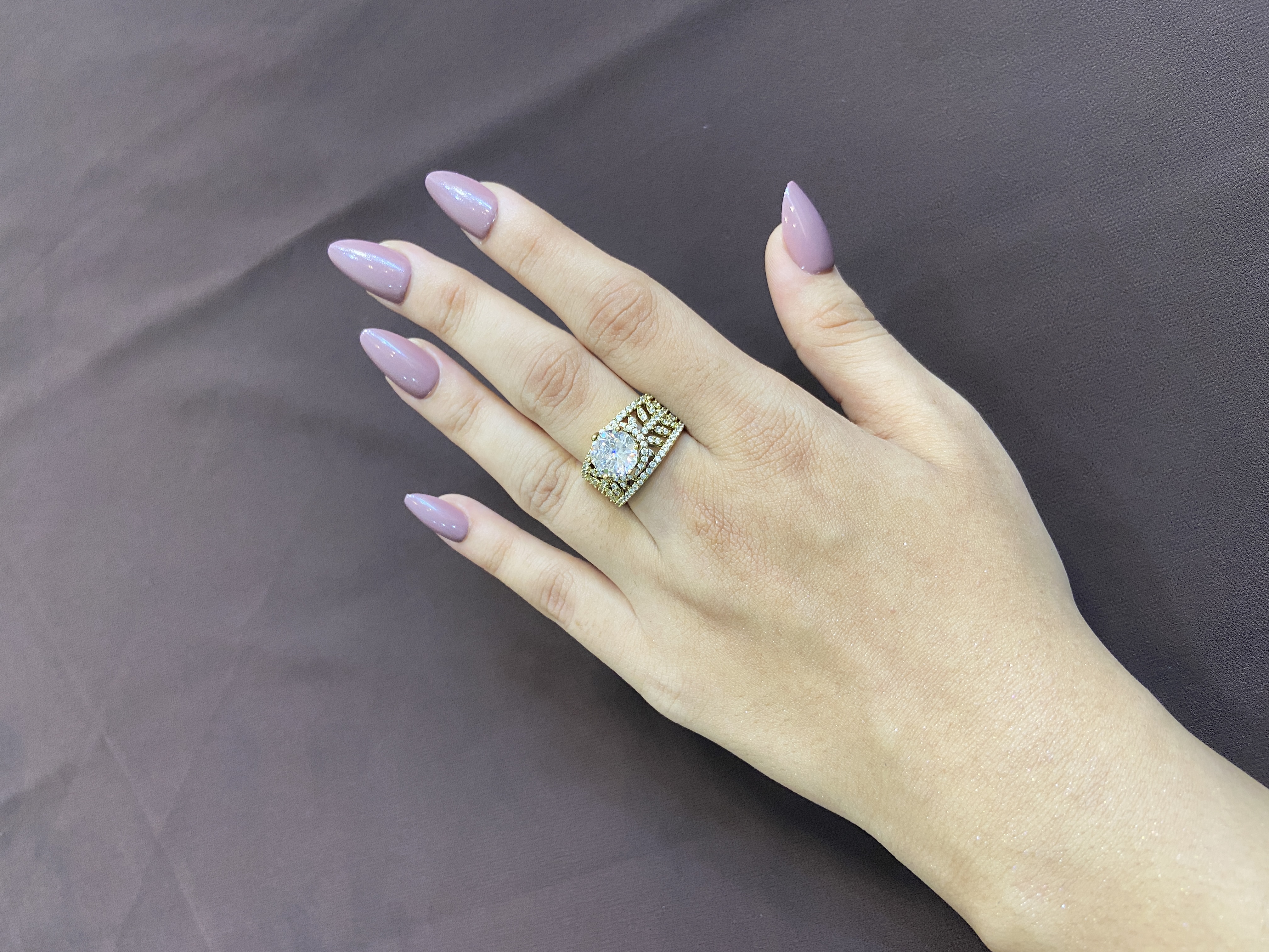 SOLITAIRE DIAMOND RING WITH LEAF CUT DESIGN IN VICTORIAN POLISH
