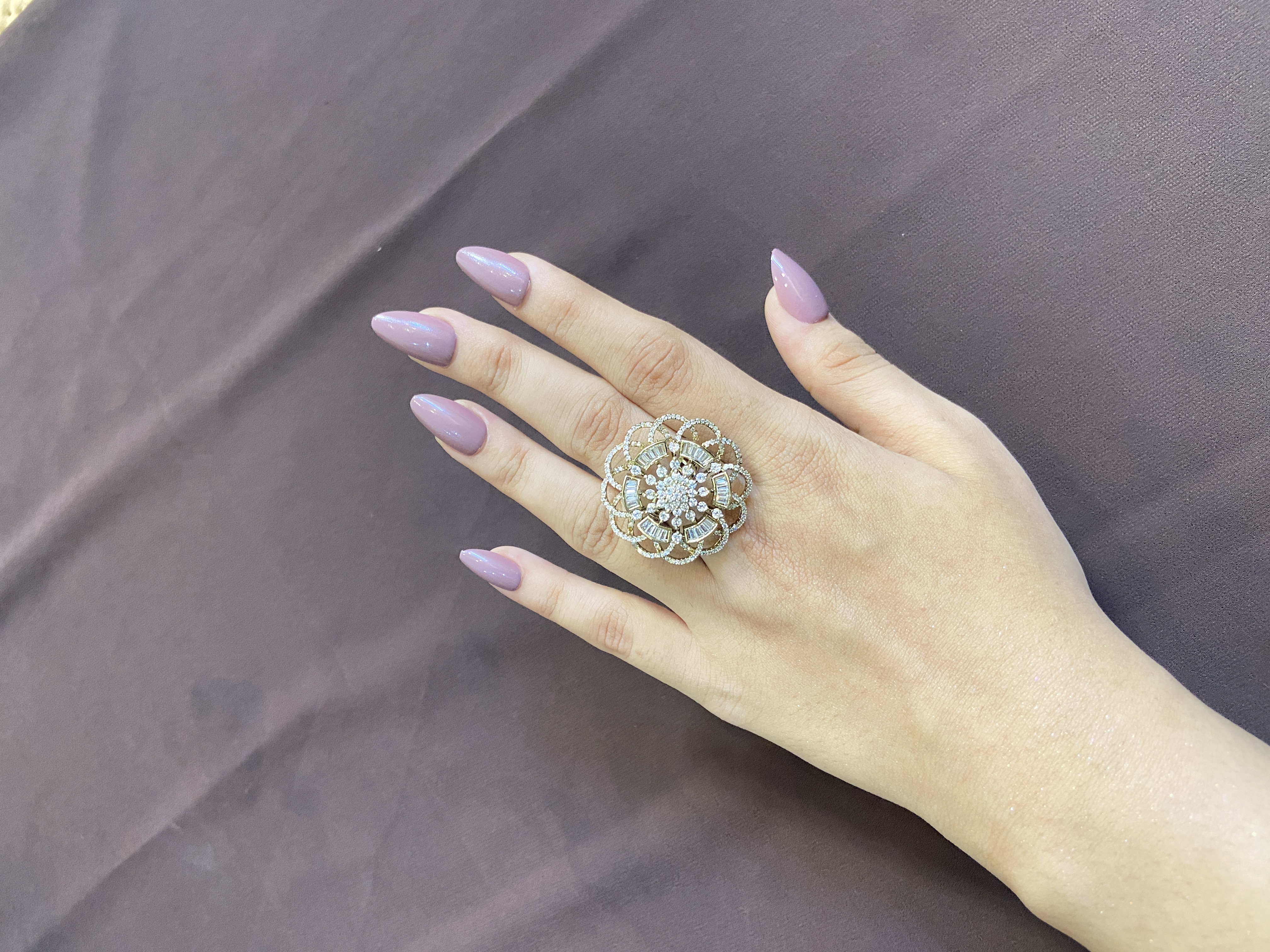 GOLDEN FLORAL OUT WITH BUGGETS DIAMOND RING