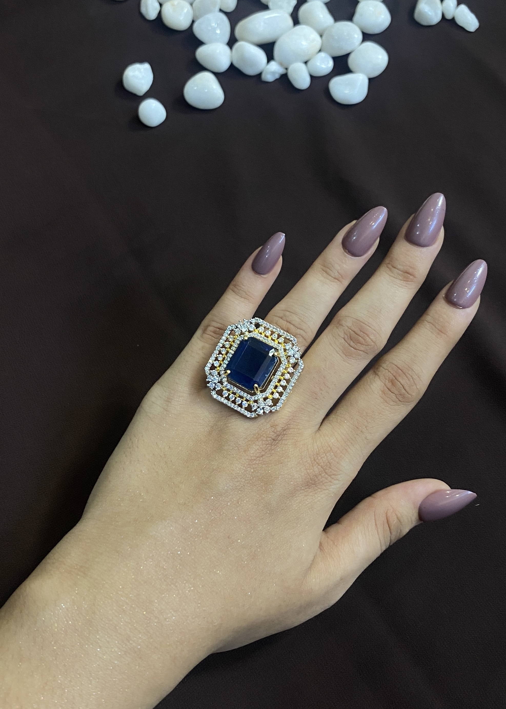 SAPPHIRE CENTRE STONE WITH ELEGANT DIAMOND BORDERS RING