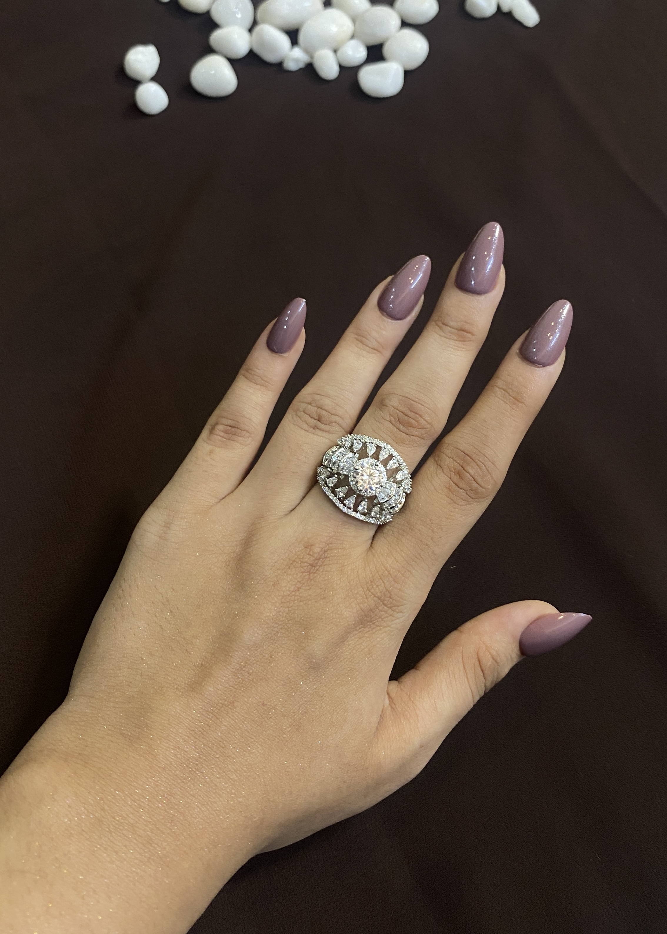 SOLITAIRE DIAMOND WITH SIDE PEAR STONES RING