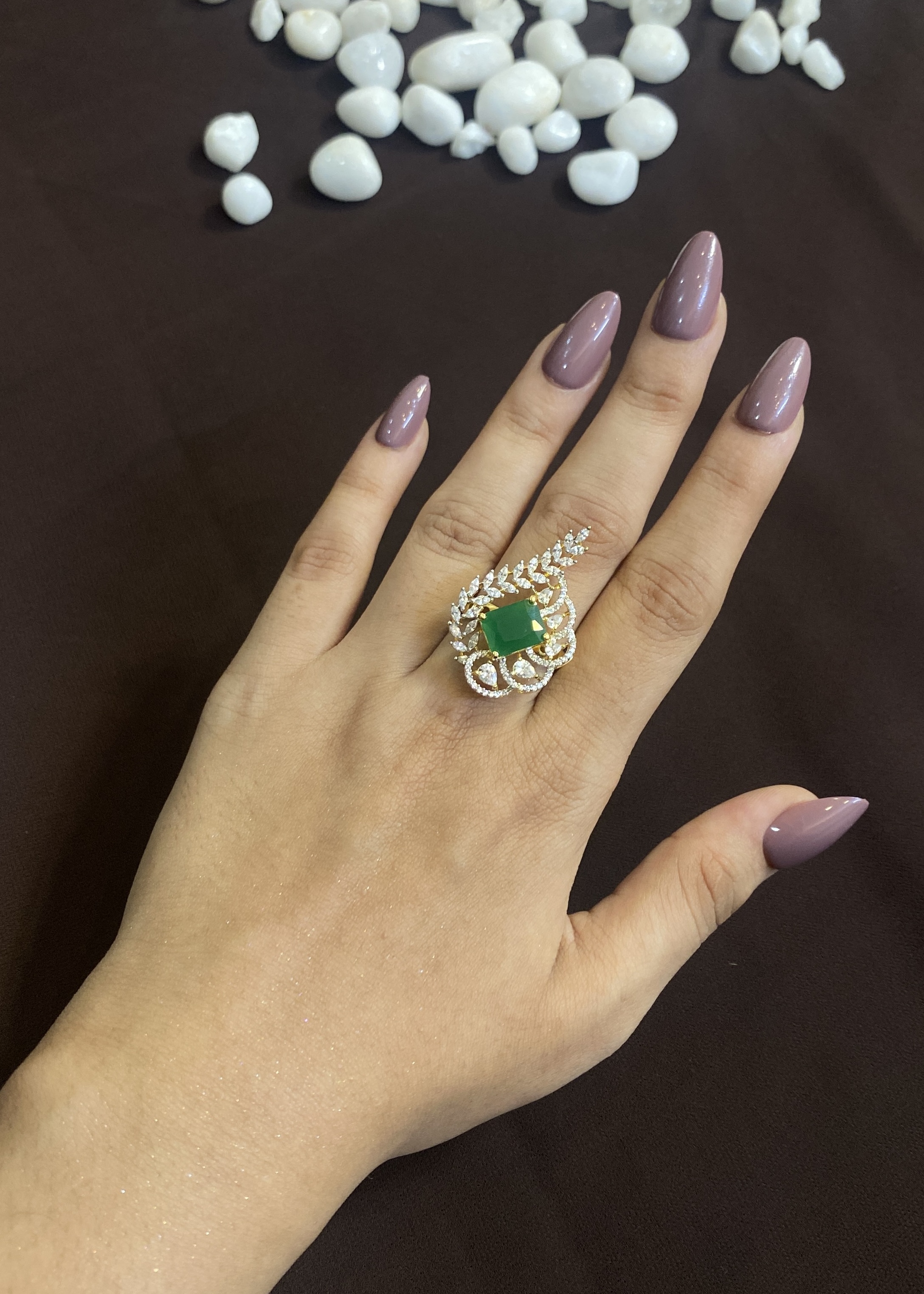 CENTRE GREEN DIAMOND PEAR SHAPED RING