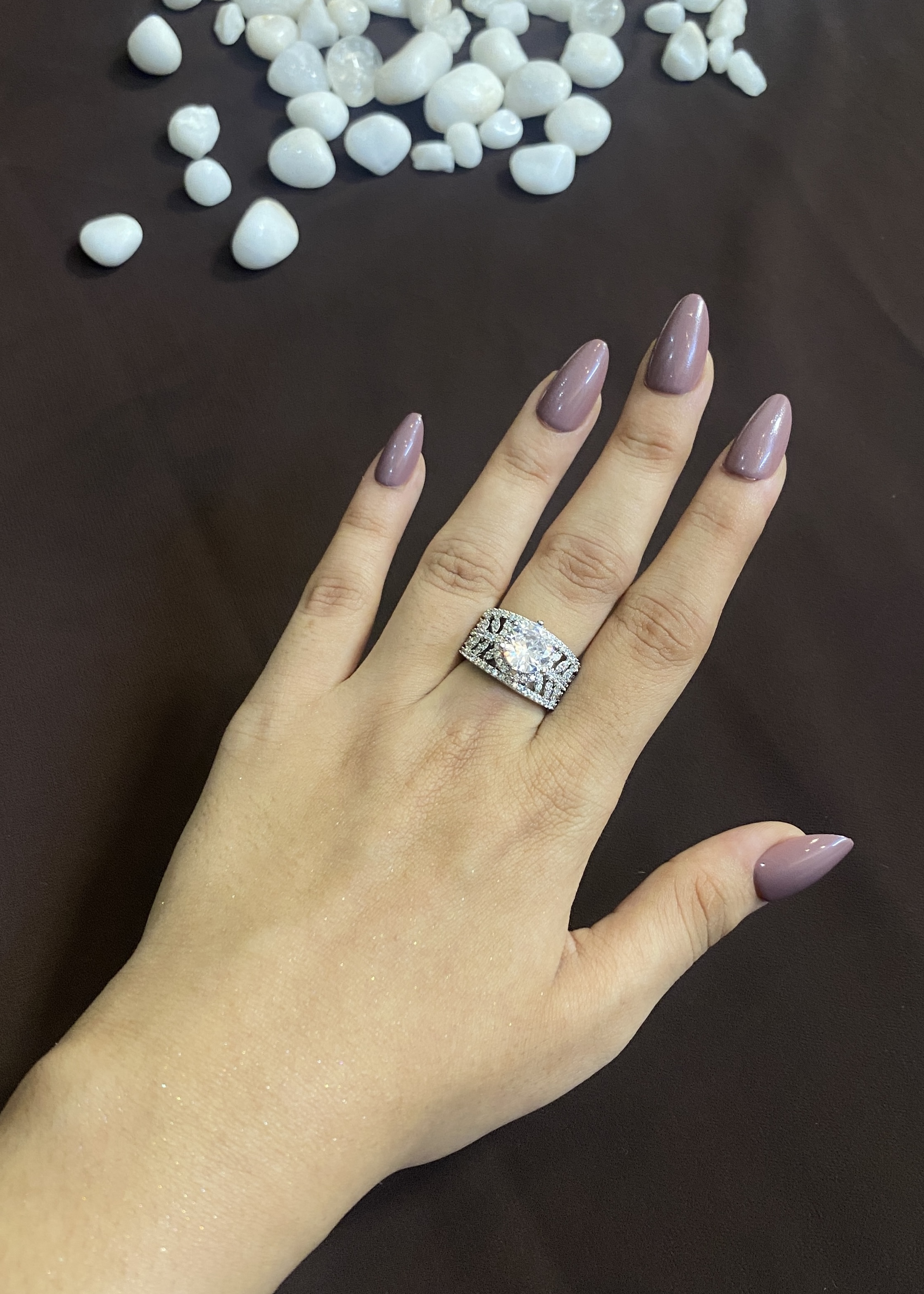 SOLITAIRE DIAMOND WITH SILVER STONES DESIGN RING
