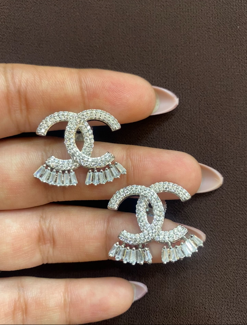 CHANEL LOGO WITH HANGING BUGGET DIAMOND TOPS