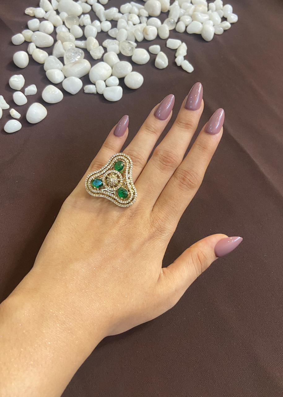 CURVED TRIANGLE EMERALD DIAMOND RING
