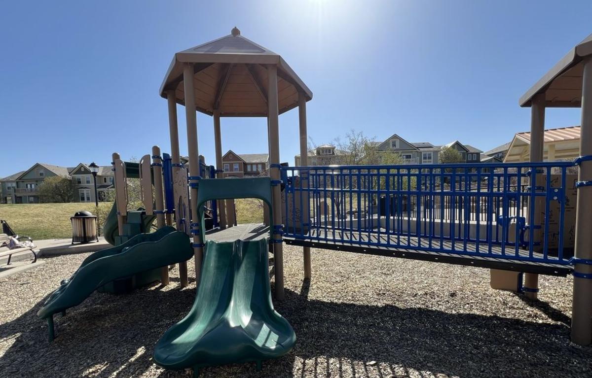 Belvedere Park playground and shaded picnic area in Lone Tree's RidgeGate community