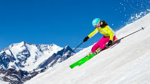 Winter ski slope with skier.