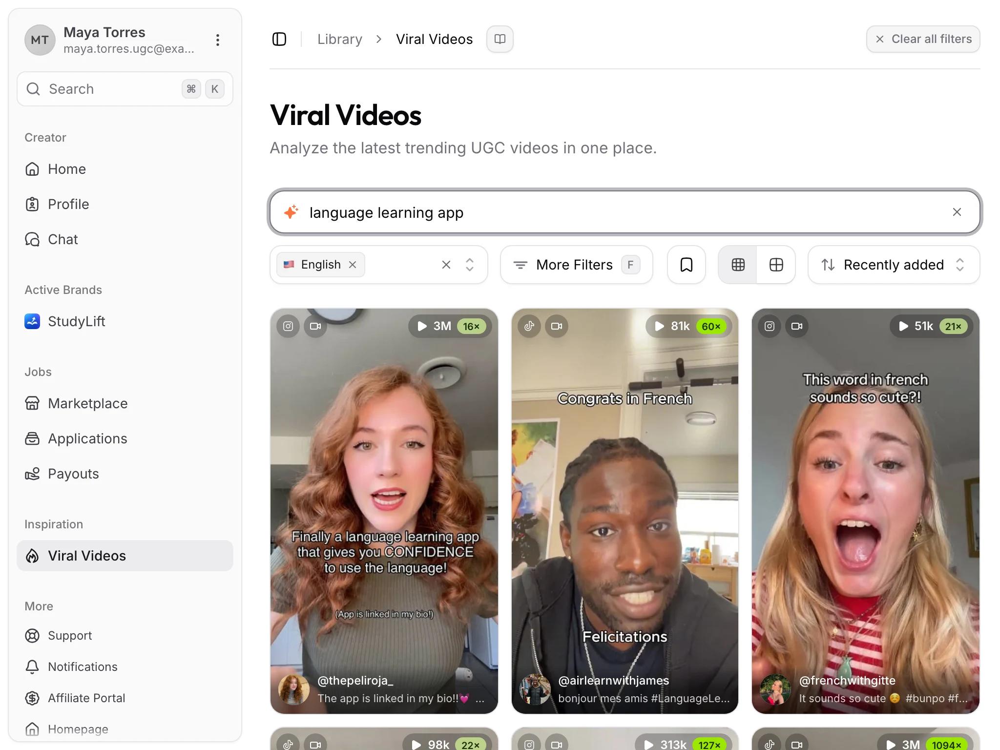 Search in plain words. The green badge shows how many times a video's views exceed the creator's follower count. The UGC Videos library searched for language learning app, showing language-app videos with view counts such as 3M and 81k and outlier badges such as 16x and 60x.