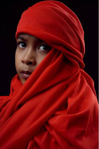 Woman in red headscarf