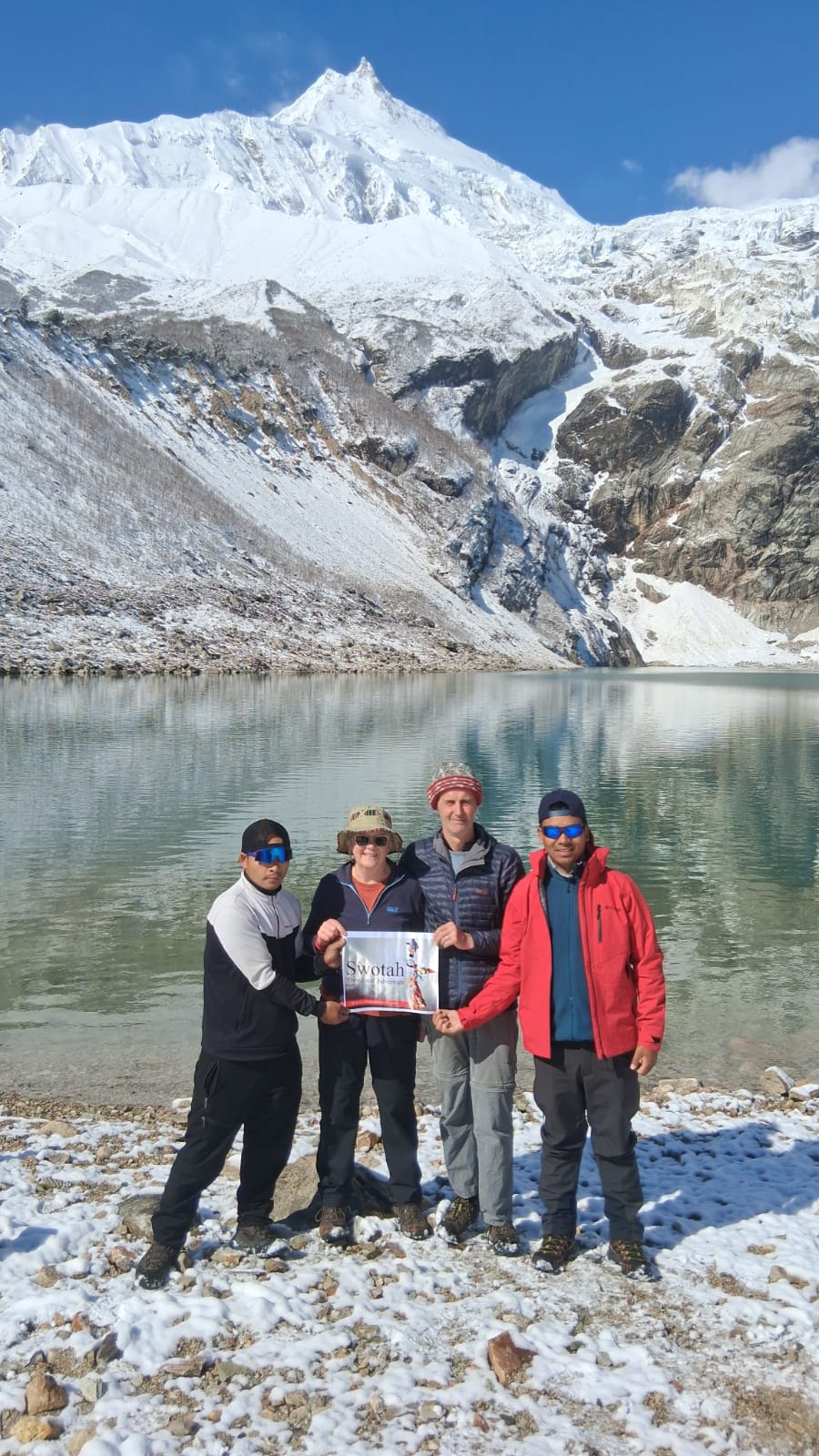 Group photo at Birendra Lake below Manaslu
