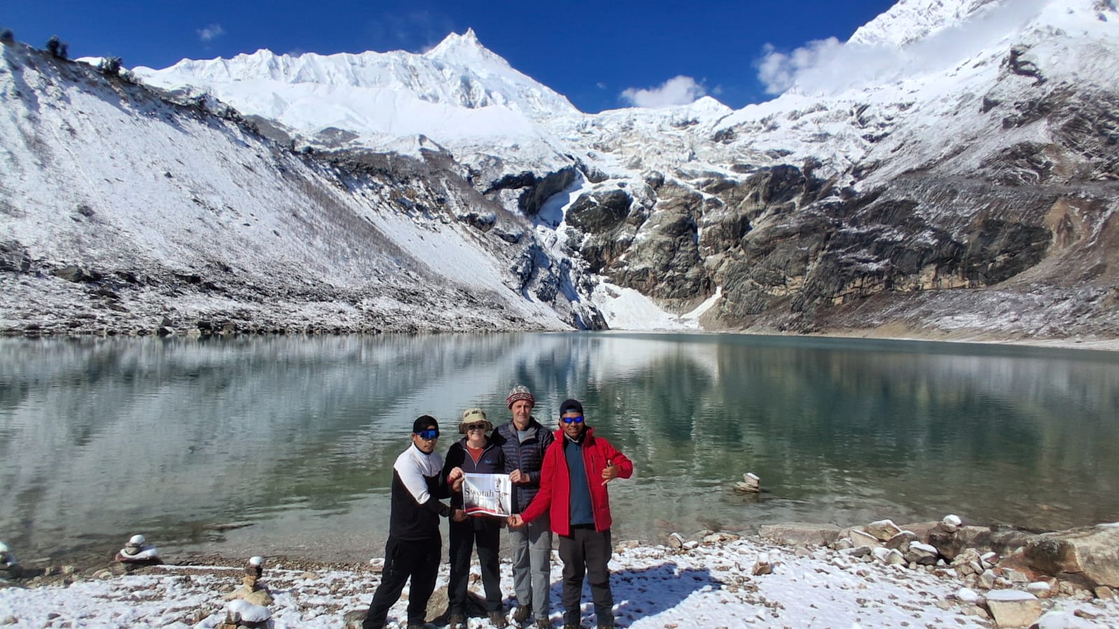 Trekkers gather beside Birendra Lake