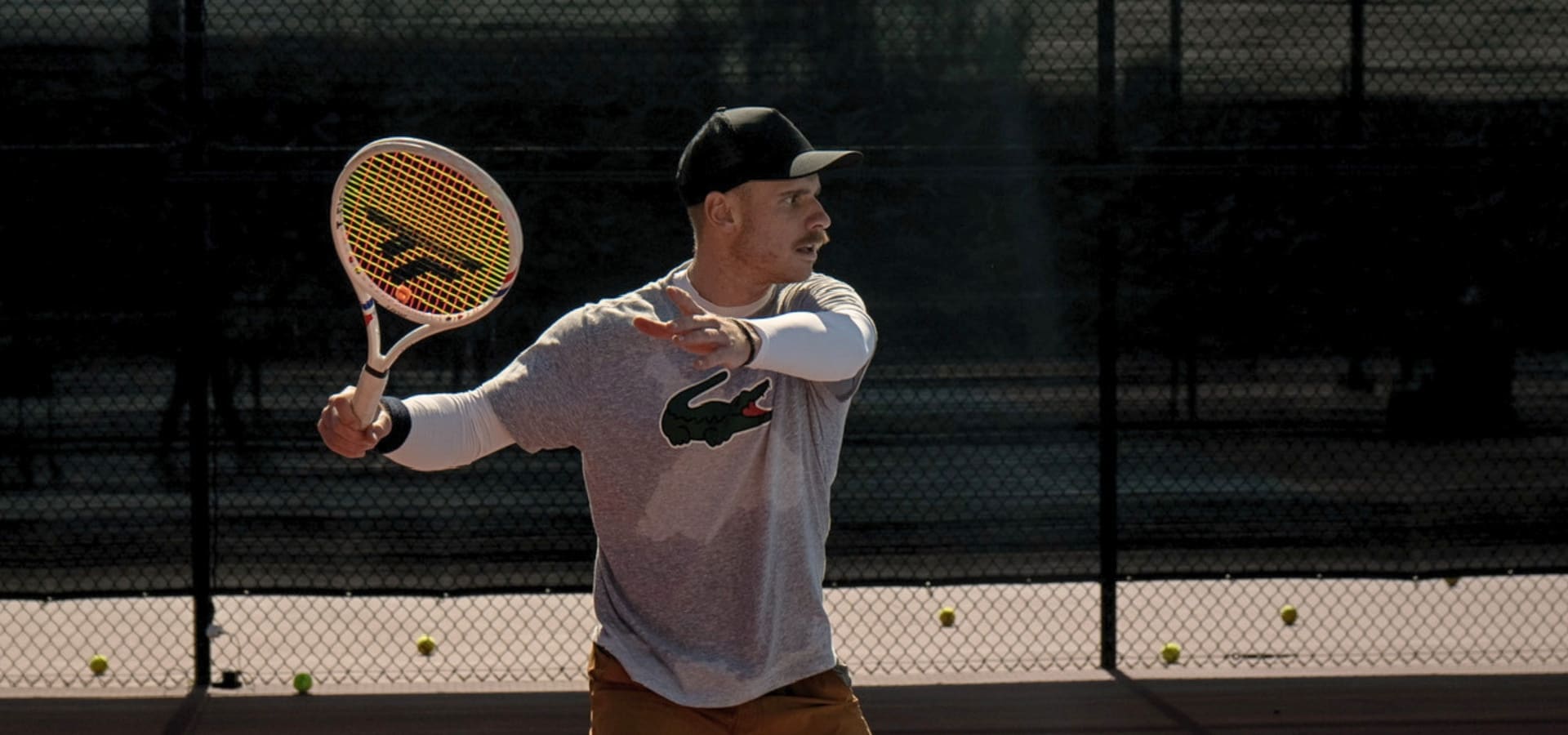 Karue Sell hitting a forehand on an outdoor court at LBTA