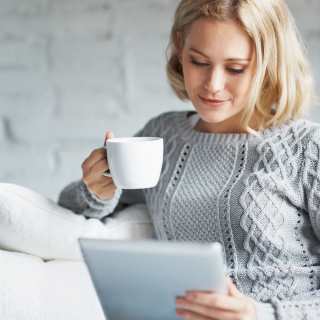 2016 Centex Stock Image, 1240 x 1240 Square Crop,5Finsteps_657_womanreadingtablet_1240x1240.jpg; She orchestrates her mornings to the tune of coffee