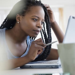 2016 Centex Stock Image, 1240 x 1240 Square Crop, Mycentexbene_701_persononcomputer_1240x1240.jpg; Black woman using laptop