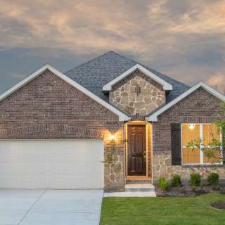 The Sheldon, a one-story home with 2-car garage, shown with Home Exterior C 