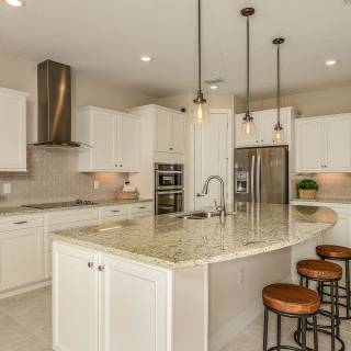Kitchen with Island for Meal Planning at Home or Entertaining with Friends