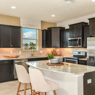 Kitchen with Island for Meal Planning at Home or Entertaining with Friends