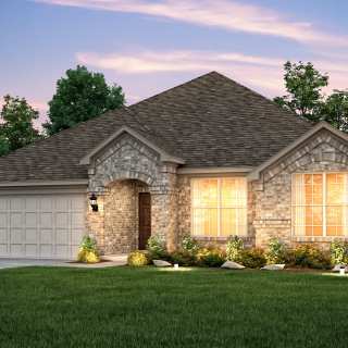 The Dunlay, a one-story home with 2-Car Garage, shown with Home Exterior B