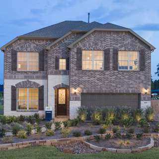 The Caldwell, a two-story home with 2-car cedar ga