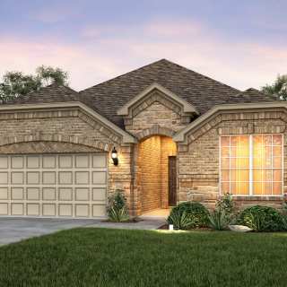 Exterior C of the Mckinney, a one-story home with stone