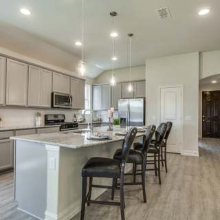 Inviting foyer leads to the eat-in kitchen featuring your choice of granite or quartz countertops