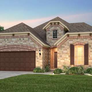 The Mooreville, a two-story home with 2-car cedar garage, shown with Home Exterior F