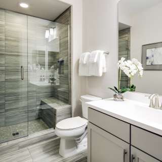 Walk-in shower with seat in secondary bath