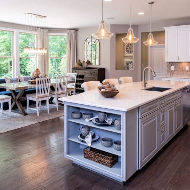 kitchen with white cabinets and attached dining room