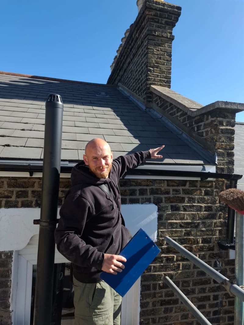 Scutts Roofing surveyor conducting a pre-purchase roof inspection on site