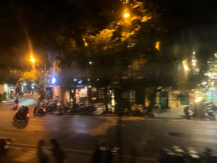 Blurry photo of Hanoi from a train car.