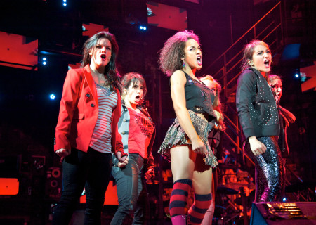 (L–R) Leslie McDonel, Gabrielle McClinton, and Krystina Alabado in "American Idiot." The national tour of the smash hit, rock opera will be presented in Los Angeles at the Ahmanson Theatre March 13 – April 22, 2012. Opening is set for March 14. "American Idiot" features the music of Green Day and the lyrics of its lead singer Billie Joe Armstrong, book by Armstrong and Michael Mayer, and direction by Mayer. Choreography is by Steven Hoggett, and music supervision, arrangements, and orchestrations are by Tom Kitt.