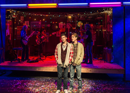 L–R, Foreground): Curt Hansen and Ryder Bach; (L–R, Background): Band members Janet Robin, Vivi Rama and Julie Wolf  in ‘Girlfriend’ at the Kirk Douglas Theatre.