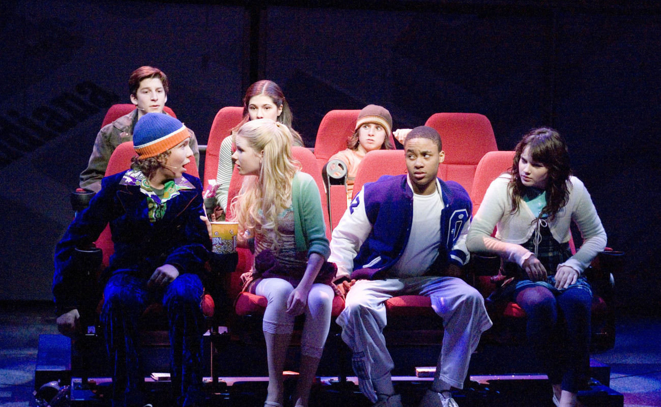 (Front, L–R) Tyler Mann, Emma Degerstedt, J.D. Phillips, Caitlin Baunoch, (Back, L–R) Ricky Ashley, Sara Niemietz, and Seth Zibalese in '13.'