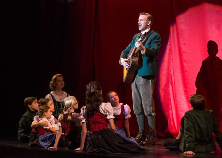 Ben Davis, who plays Captain von Trapp, with Kerstin Anderson, who plays Maria Rainer, and the von Trapp children in the national tour of Rodgers & Hammerstein’s “The Sound of Music,” directed by Jack O’Brien, now playing at the Center Theatre Group/Ahmanson Theatre through October 31, 2015. Tickets are available at CenterTheatreGroup.org or by calling (213) 972-4400.	<br />
Contact: CTG Media and Communications / (213) 972-7376 / CTGMedia@ctgla.org<br />
Photo by Matthew Murphy.<br />
