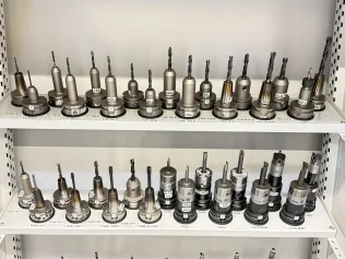 34 pcs. HSK-A63 tool holders with tools