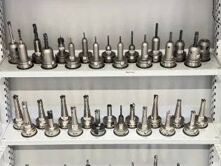 34 pcs. HSK-A63 tool holders with tools
