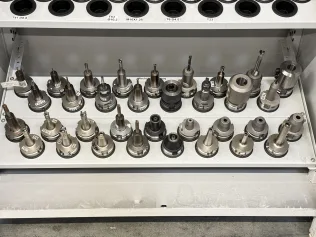 34 pcs. HSK-A63 tool holders with tools
