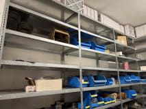 Shelving System with Spare Parts, Hydraulic Components, and Operating Supplies - Image 4